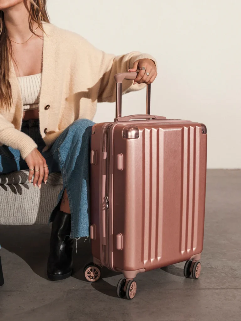 this image shows the ambeur carry on suitcase in rose gold
