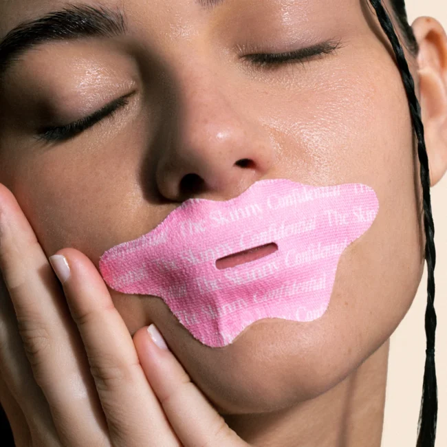 this image shows what the skinny confidential mouth tape looks like on someone