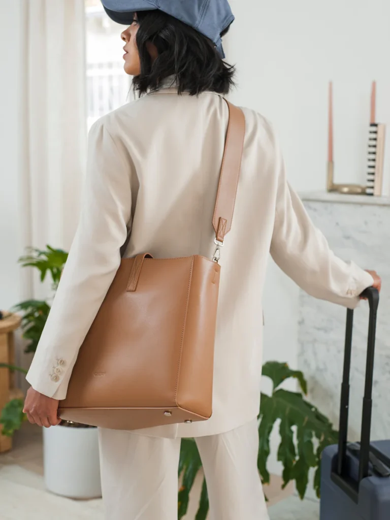 this image shows the haven laptop tote in color toffee