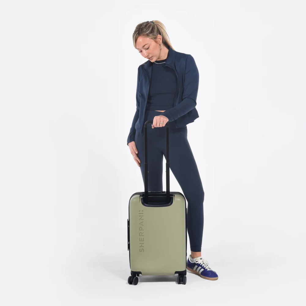 sherpani-luggage-meridian-22-inches-sage-on-model-image