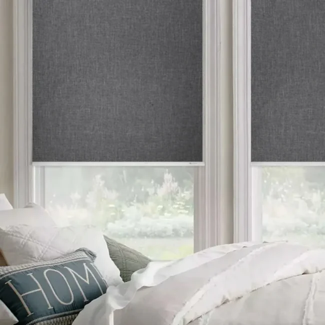 Yoolax motorized roller shades in a living room