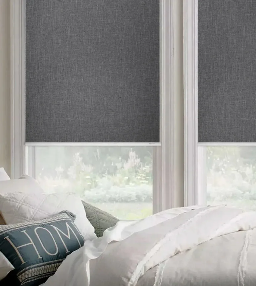 Yoolax motorized roller shades in a living room